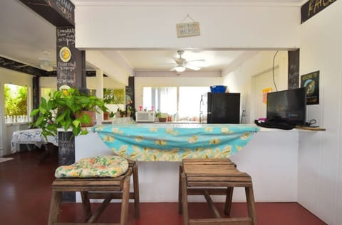 bar area with DIrect TV and kitchen area