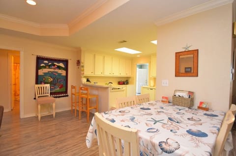 view towards kitchen from den showing pub table
