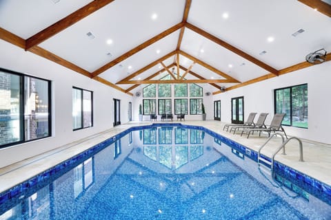 36 foot long inground heated pool with a 9' deep end.