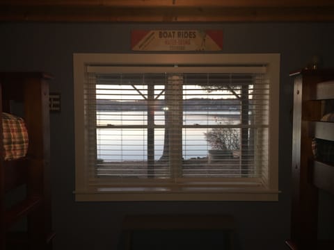 View to the lake and patio from bedroom #3.