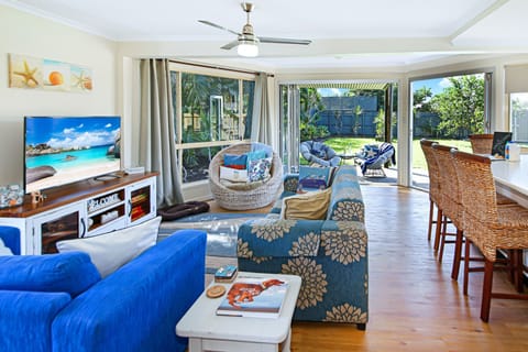 Lounge and bi fold doors open to the back yard 