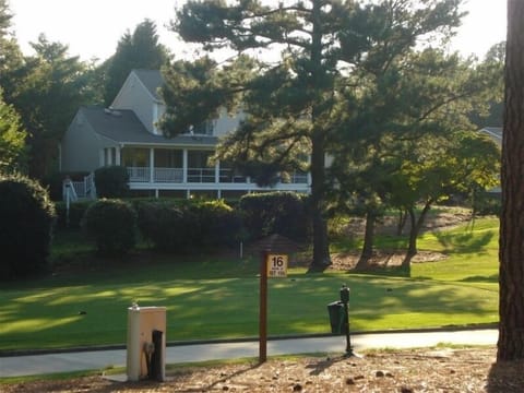 You can almost tee off from the porch!  One par 4 away from PCC Clubhouse.