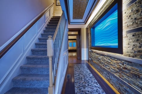 This 16' Snowdrift Wall Sculpture Changes Colors Throughout The Day