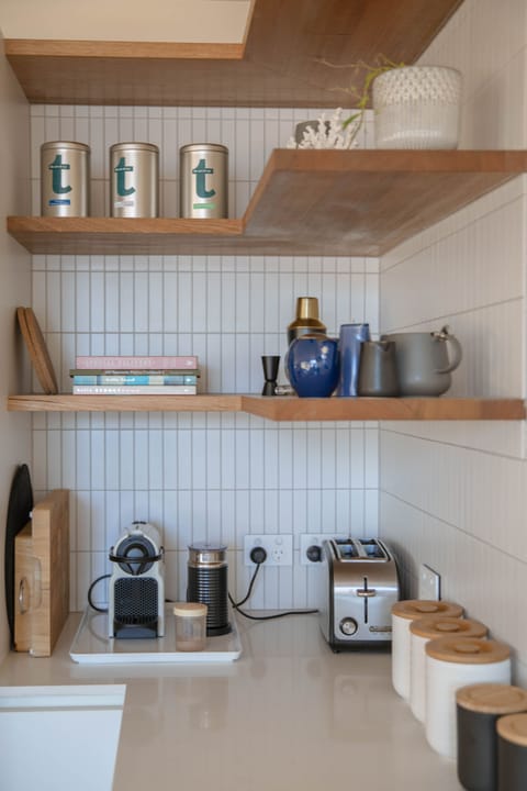 There is a selection of tea leaves for guest use from the Art of Tea.