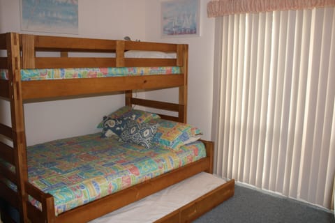 2nd Bedroom - single top, double, single trundel 