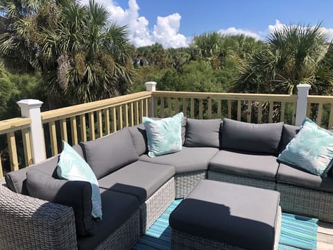 Kick up your feet and relax to the sounds of the waves and the ocean breeze.
