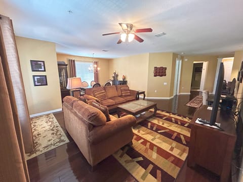 Spacious living room with comfortable couch.
