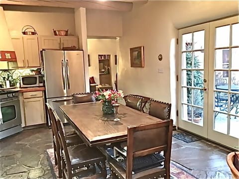 kitchen open to patio and living. Table sits 6 and easily extend to sit 12. 
