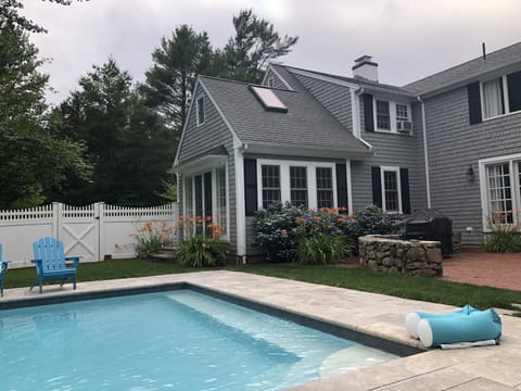 Lovely heated pool in private backyard setting.