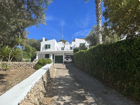Villa on the right with Volvo in front.