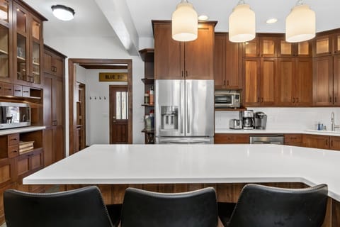 Large island, great for cooking and serving large groups! Fridge has a bottom freezer, wine drawer, and ice/water dispenser