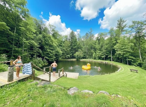 Your own private swimming pond right in the back yard! We provide beach and water toys. 