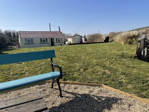 Beach garden with seating overlooking the beautiful golden sandy beach