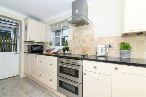 Well equipped kitchen with double oven.