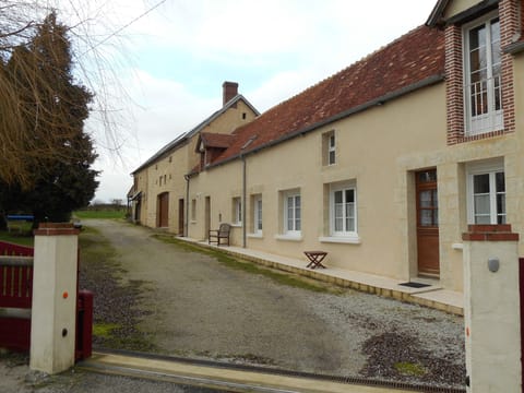 Entrance drive showing 2 gites and longere