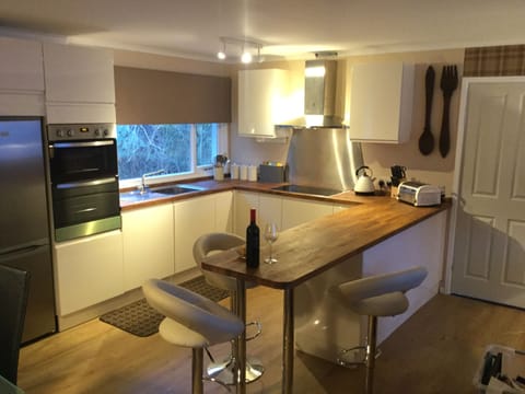 Fully equipped kitchen .