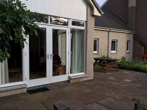 French doors leading from the living area onto the enclosed patio space