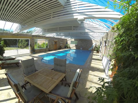 Indoor Swimming Room with slide sauna and two shower rooms and sunbeds