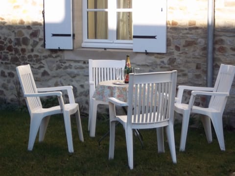 Table and chairs  for drinks outside the cottage