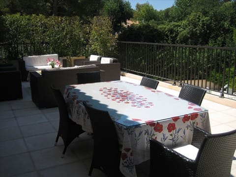 Private veranda showing dining and sitting areas