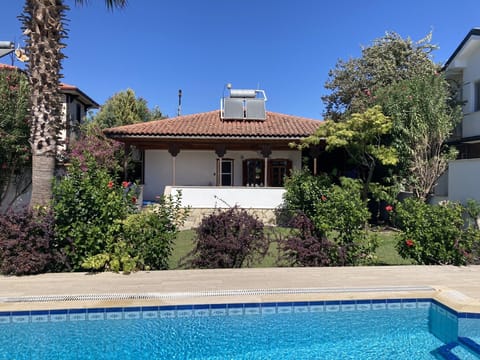 Garden and pool at rear of villa
