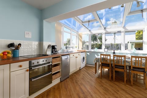 Bright kitchen diner with seating for 8