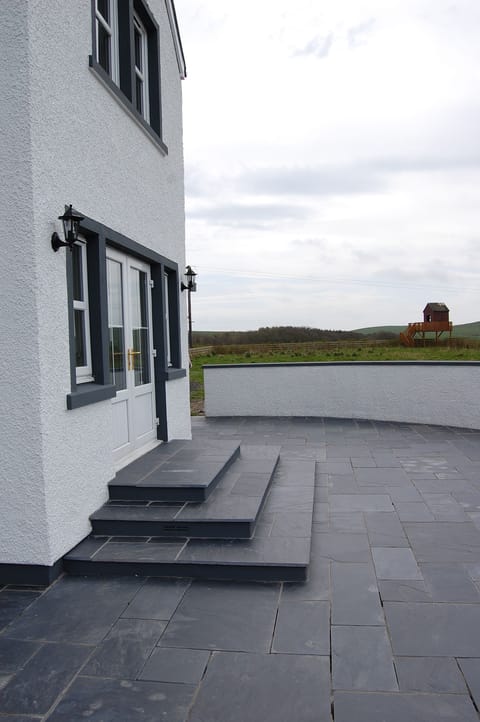 paved patio area at front