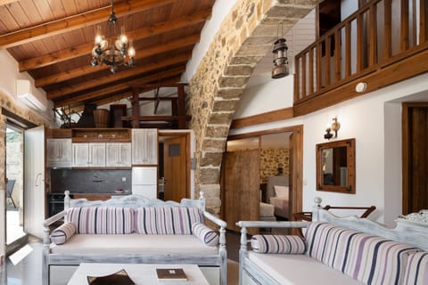 Third residence-the living room area is airy and sunny!