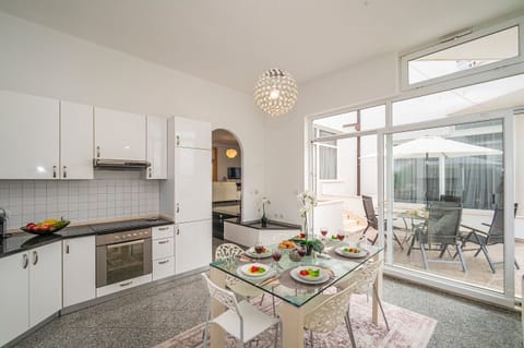 Apt 2 middle floor - kitchen and dining area opening onto a terrace