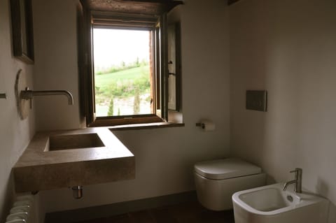 luxury bathroom 1 in travertine marble and brushed stainless steel