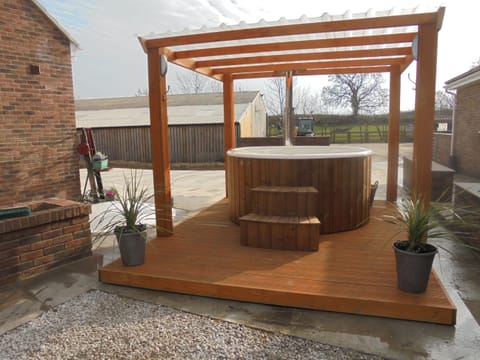 our new 6 person hot tub to hire towels and robes included