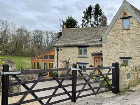 View of the house from the road side . Parking for 4-5 cars.
