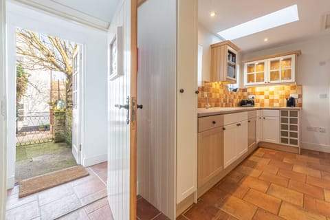 Ground floor: Kitchen leading to garden courtyard