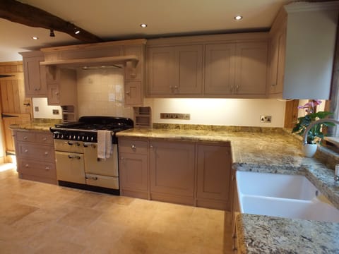 Bespoke Kitchen with Range Cooker and seating area