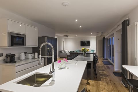 Kitchen looking back to dining and lounge.