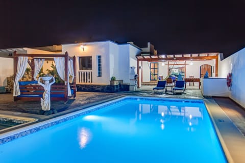 Outside area with 8x4m pool, separate childrens pool, BBQ area, balinese bed