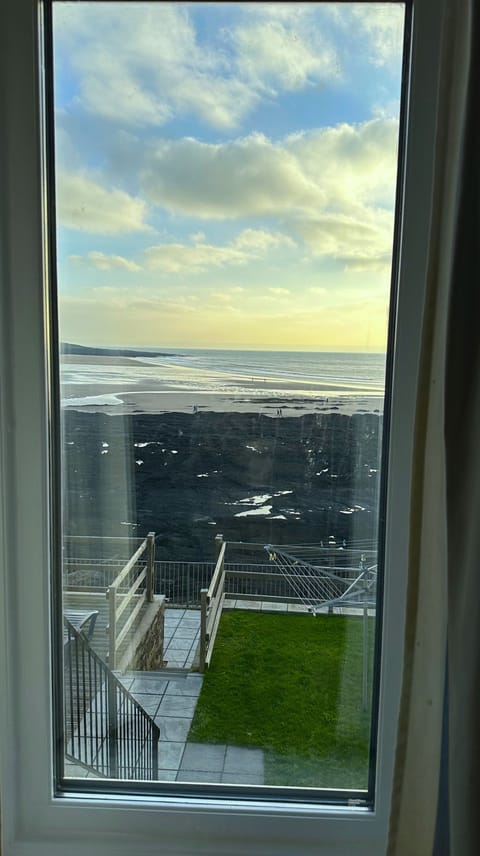 Window in the lounge area overlooking the sea