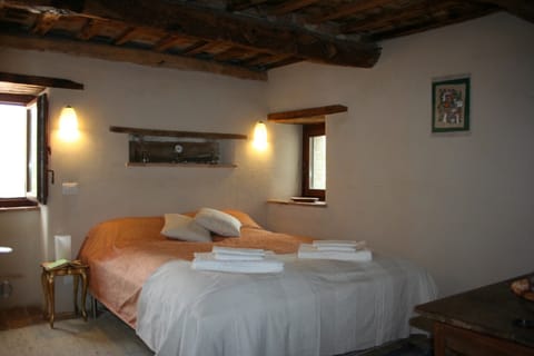 Bedroom 2 as a double with views to the top terrace and valley