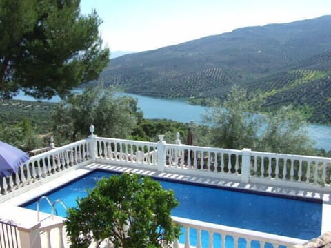 View of the pool and lake from the master balcony.