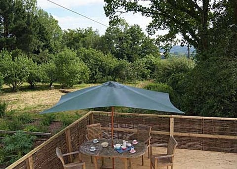 Enjoy al fresco dining on the private deck.