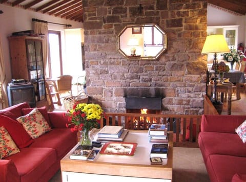 Sitting room with kitchen beyond