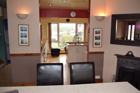 Open plan kitchen/diner with large window over looking the garden and fields.
