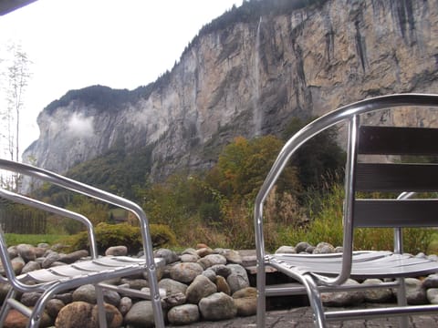 sit in garden below next to the creek to get a different perspective on scenery