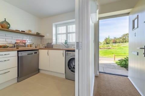 Ground floor: Entrance hall leading to the kitchen