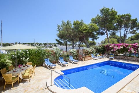 Private pool with comfortable sun loungers