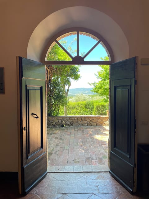 Main door on to terrace.The ground floor has 5 French windows on to the terraces