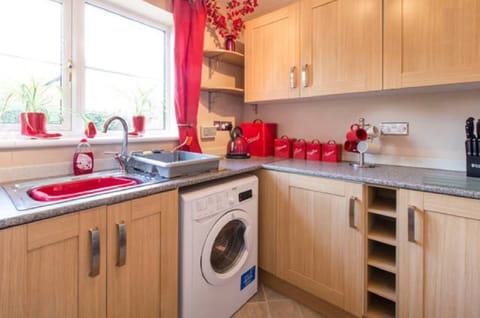 A washer/dryer plus a table top dishwasher are provided to make life easier!