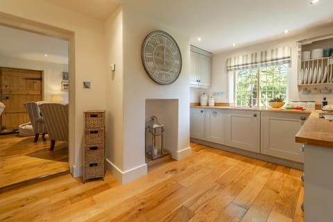 Ground floor: The kitchen leads to the sitting room