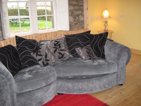 relax by the open fire on cosy sofas