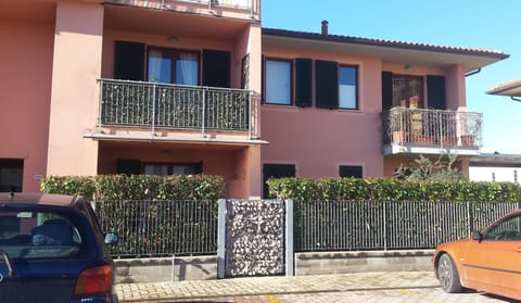 Seen from the outside: first floor, 2 big balconies, two parking spots